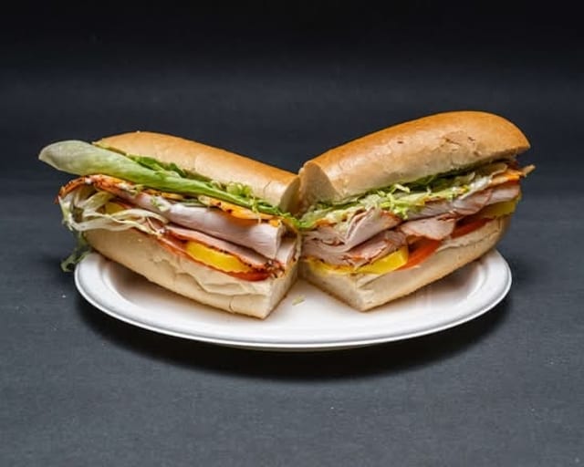 Cracked Peppermill Turkey Sandwich on Hero.